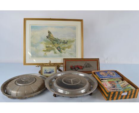 Two hub caps, stainless steel coloured 1938 SS Jaguar 100, in frame 15.5cm x 36 cm and a pencil signed Harold Johnson spitfir