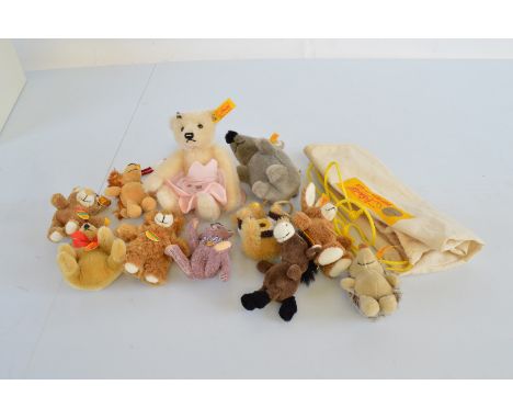 A collection of Steiff Cosy Friends keyrings, including Hedghog, Rabbit, Donkey, Lion, etc. Together with two miniature Steif