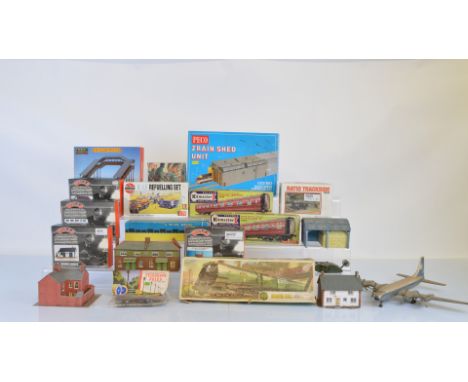 A good quantity of model kits and model railway accessories, including Kitmaster coach kits, Airfix German Infantry figure se
