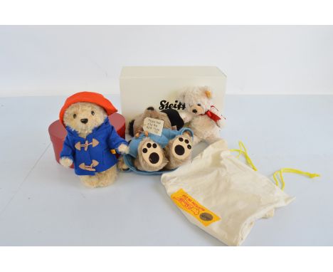 A boxed modern Steiff, The Golden Anniversary Paddington Bear 01044, together with a small example and Sweetheart Bear 109904
