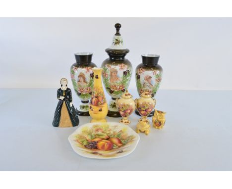 A Victorian opaque glass hand painted garniture, comprising lidded vase and two vases all decorated with maidens in profile a