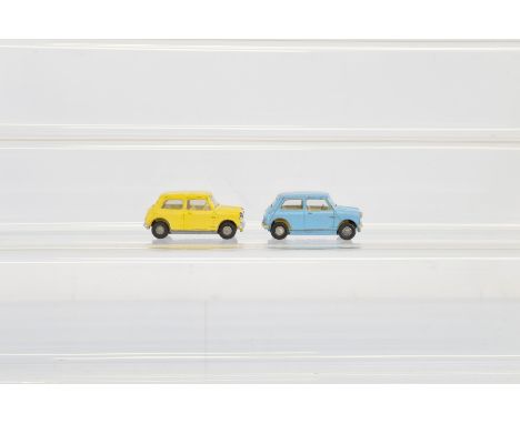 Two unboxed Tri-ang Spot-On 211 Austin Seven diecast model cars,  in yellow and light blue, both with some 'touch-ins' to the