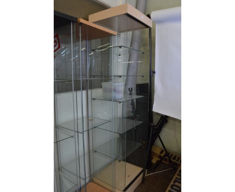 An open display cabinet, having five glass shelf interior on plinth base, 48cm x 44cm x 186cm high