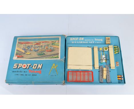 A boxed Tri-ang Spot-On L162-1 Shell and BP Garage Set, contents include Shell and BP signs, six pumps and two oil bins with 