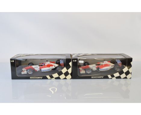 Two Paul's Model Art Minichamps Toyota Formula 1 1/18 scale models, Panasonic Toyota Racing TF 103 O. Panis and Toyota TF102 