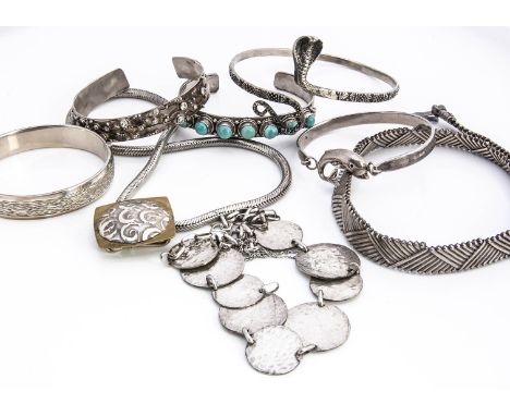 A heavy silver continental necklace marked 925, together with a quantity of silver bangles and one arm bangle of serpent desi