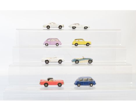 Eight unboxed Tri-ang Spot-On diecast models, with varying degrees of playwear and variable amounts of repainting including t