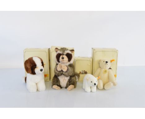 Four boxed Steiff bears, including 1905 Classic 001604, Racoon, baby Polar Bear and a puppy (4)