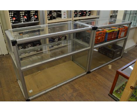 Two open counter top display cabinet, having glass shelf interior, 120cm x 55.5cm x 91cm high