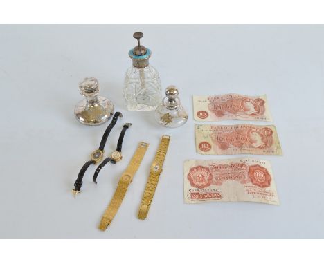 A collection of lady's wristwatches, including a gold example, various scent bottles, one with blue guilloche enamel to top (
