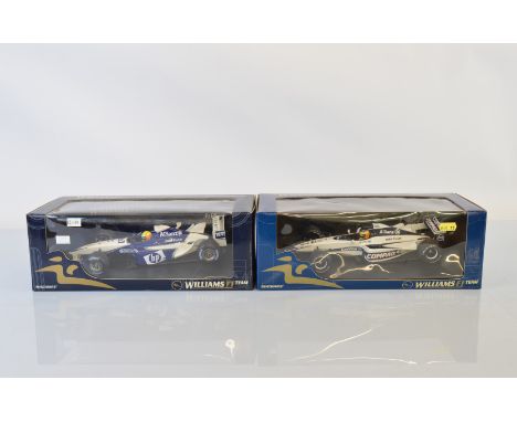 Two Minichamps Paul's Model Art Williams Formula 1 1/18 scale models, Williams BMW FW 22 R. Schumacher and Williams F1 BMW Sh