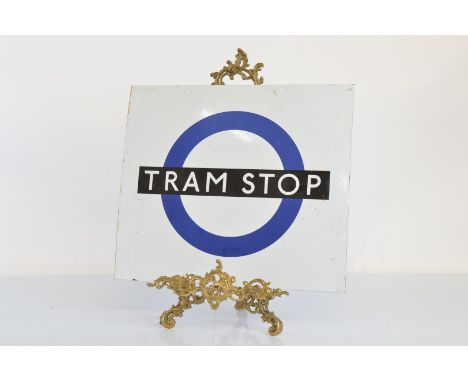 A mid 20th century enamel London Transport Tram Stop sign,  39cm x 45cm. Together with a metal tram number sign "72" 40cm x57