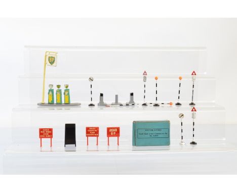 A boxed Tri-ang Spot-On L208/B Small Road Under Construction Set, contents unchecked for completeness, together with unboxed 