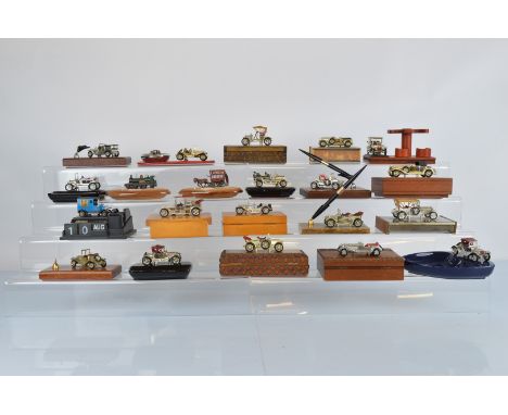 Twenty One Lesney Matchbox Model Of Yesteryear mounted souvenir items, including trinket boxes, pen trays, ashtrays, matchbox