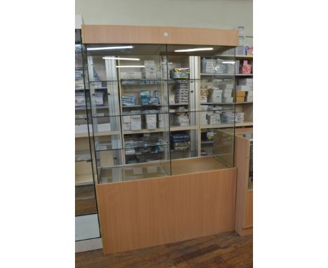 Two display cabinets, having six shelf glass interior over two division open bottom section, 121cm x 47cm x 178cm high