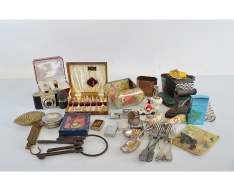 A mixed lot of assorted collectables, including lighters, Mappin &amp; Webb salad servers, silver plated spoon sets, Walt Dis