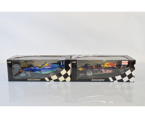 Two Minichamps Red Bull Formula 1 1/18 scale models, Sauber C 18 P. Diniz and Red Bull Racing Renault RB6 M Webber 2010, boxe