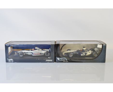 Two Hotwheels Racing Williams Formula 1 1/18 scale models, Wiiliams F1 BMW FW25 Juan Pablo Montoya and Williams F1 FW22 Jenso