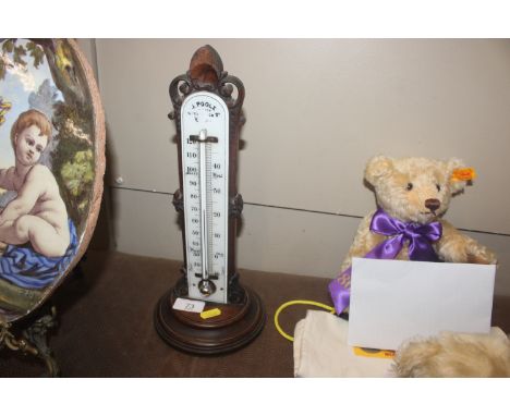 A J. Poole thermometer on carved wooden stand AF