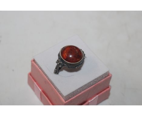 A vintage oxidised silver and amber ring, ring size L/M, possibly Kalevela Koru 
