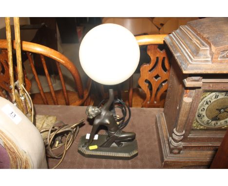An Art Deco style table lamp in the form of a ball dancer
