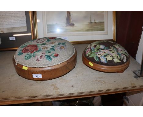 Two circular wooden stools with tapestry seats 