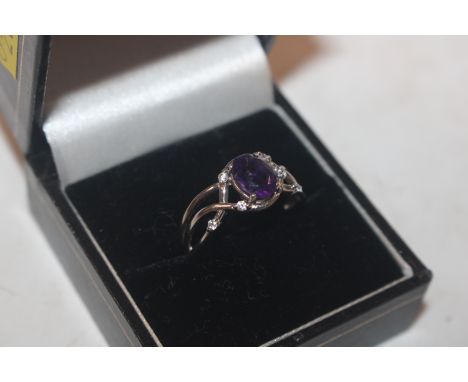 A 925 silver and amethyst set ring 