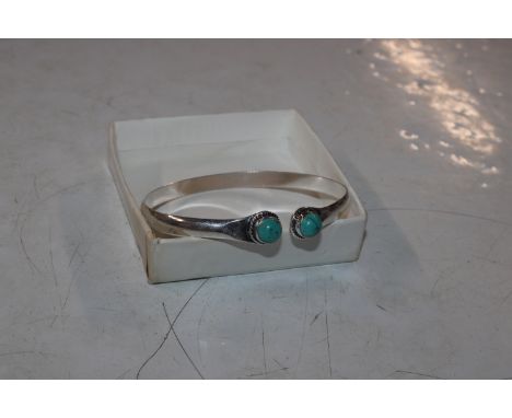 A 925 silver and turquoise bangle 