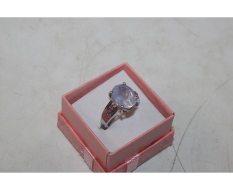 A Sterling silver moonstone and tourmaline set ring, ring size N/O, approx. 4.5gms 