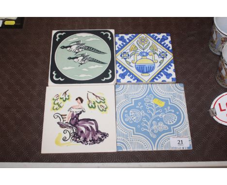 Four various Poole pottery Carter tiles 
