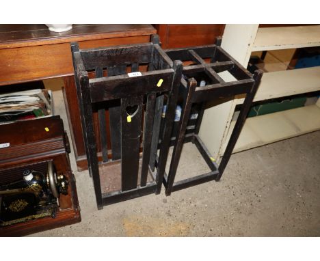 An Arts & Crafts Liberty style stick stand and a four division stick stand 