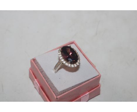 A Sterling silver Lolite and cubic zirconia ring P/Q
