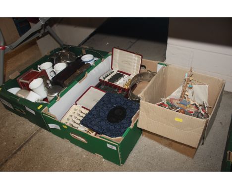 Three boxes containing various silver plated tea ware; Royal Commemorative mugs; a boxed set of six each Royal Crown Derby kn