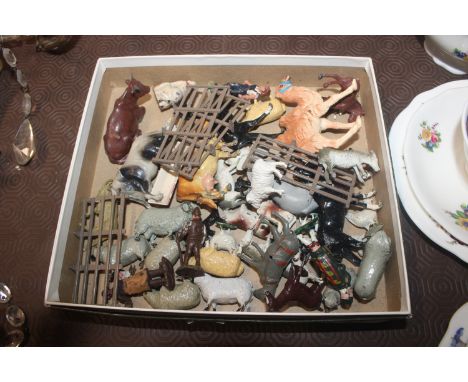 A box containing Britains and other model farm animals 