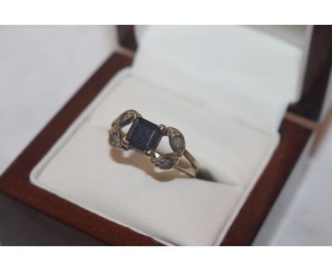 A 9ct gold ring set with amethyst and white stone set shoulders, ring size N/O, approx. 2.5gms total weight