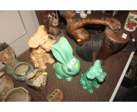 A Sylvac green glazed pottery rabbit AF; a Sylvac model of a seated terrier and another smaller example