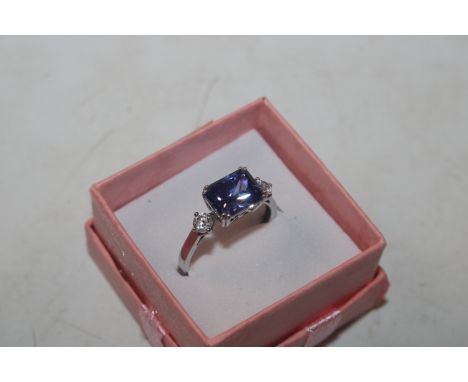 A Sterling silver topaz and cubic zirconia princess ring, ring size O/P, approx. 6gms  