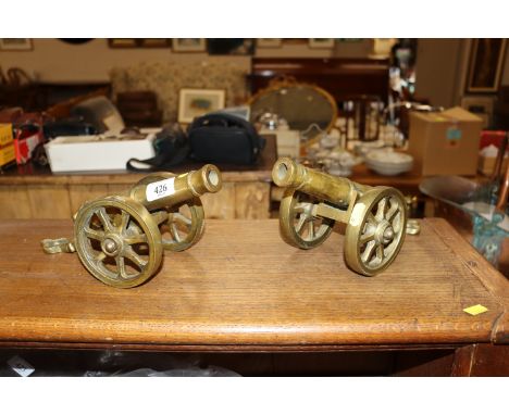 Two brass model cannons 
