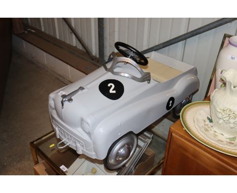A Gear Box Pedal Car Co. toy pedal car