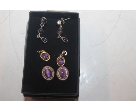 A pair of 9ct gold and amethyst set ear-rings, approx. 1.5gms total weight; and two pairs of 925 silver and amethyst set ear-