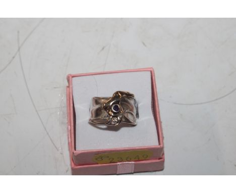 A Sterling silver Studio ring set with garnet, ring size N/O, approx. 6.5gms 