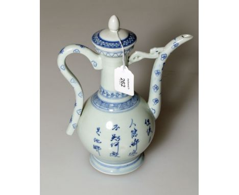 A Chinese blue and white porcelain ewer and cover, painted with an official seated at a tea table with a young boy, bearing t