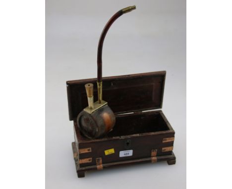 A 19th century Chinese bamboo section and brass opium pipe,together with its iron and brass bond teak wood box.,30 cm long.
