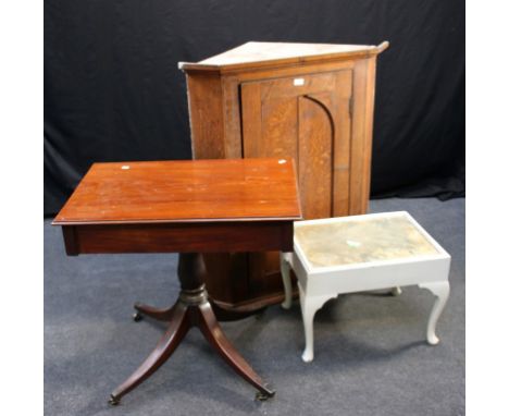 A George III oak single door hanging corner cupboard, together with a late 17th century oak oval gate-leg table, with bobbin 