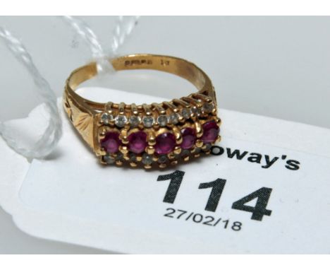 A ruby and diamond clear stone three row half hoop ring, in 22ct gold mount