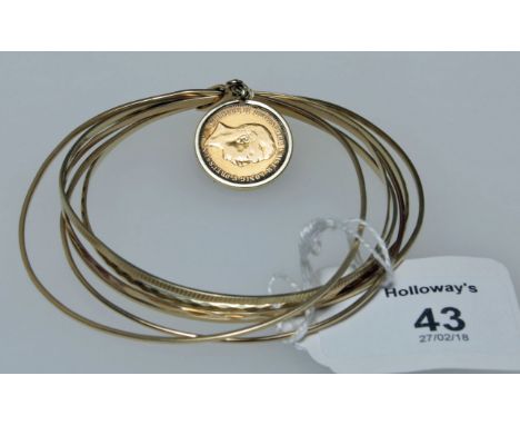 A six strand multi-bangle, with a ten mark coin, dated 1893, suspended as a charm