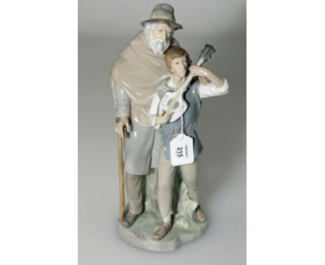 A Lladro porcelain figure group of an elderly traveller and a young man playing a lute, 36 cm