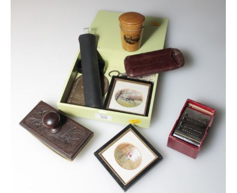 A mixed lot of collectors items, including a Mauchline cased tot glass, Edwardian blotter, leather cigar case, papier mache s
