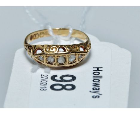 A five stone half hoop diamond ring, the graduated rose-cut diamonds in pierced and carved 18ct gold mount