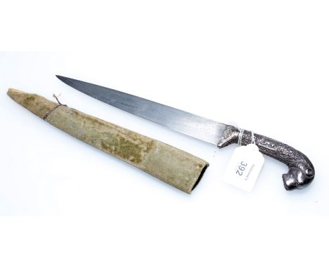 A 19th century Indian knife, the 20cm single edge blade with florally worked white metal grip and tiger mask pommel, in an as